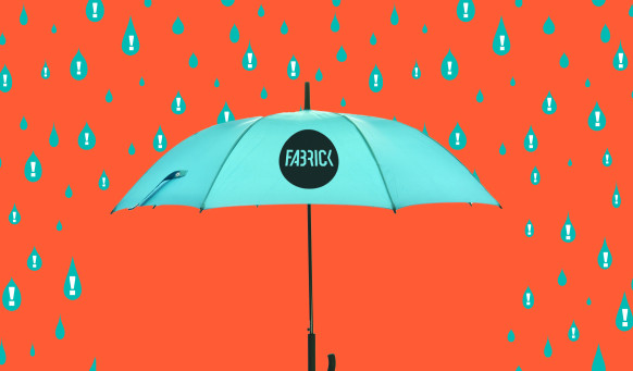 A blue Fabrick branded umbrella set against an orange background with blue rain drops falling